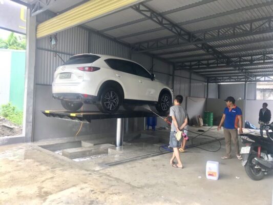 Những thiết bị không thể thiếu cho một gara chăm sóc xe Cầu nâng hạ rửa xe ô tô 1 trụ